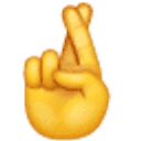 Hand mit gekreuzten Fingern